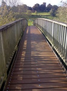 Newly repaired bridge between Doctors Meadow and the Spinney Nature Reserve