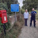 Parish Council Vice Chairman Alyson Lister with PSCO Stuart Carroll with the new bridleway signage at the Little Ness Road Junction. Signage reads: Bridleway only, No motor vehicles beyond this point except access to residents.